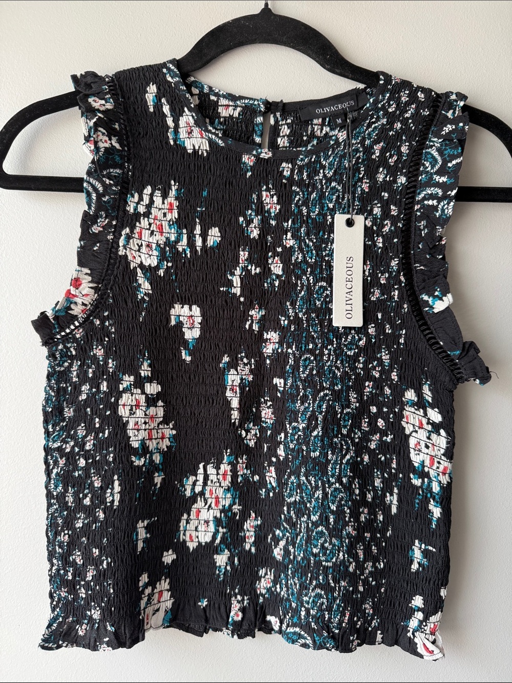 Olivaceous Black Floral Ruffled Smocked Tank with Teal & White Accents. Medium